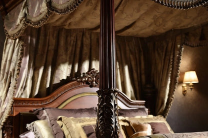 Detail of carved Victorian canopy bed post, decorative solid wood column with classical ornamental carving