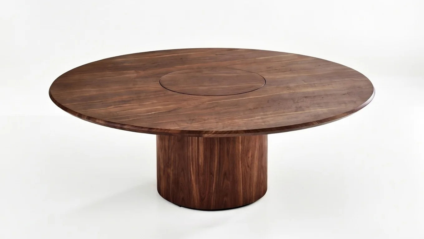Luxury round walnut dining table with smooth edge and centered circular inlay detail, rich natural grain pattern, minimalist pedestal base