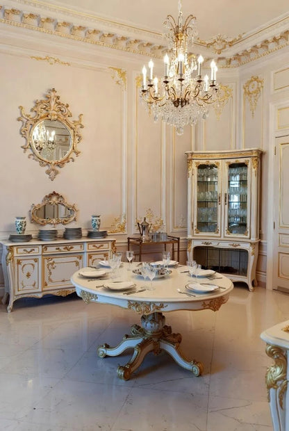 Complete cream white and gold French Baroque dining set: hand-carved round table, armchairs, ornate vitrine cabinet, and gilded sideboard – opulent Louis XV luxury furniture