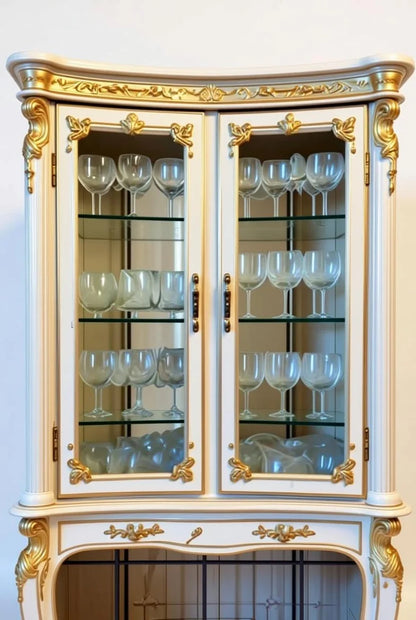 Tall cream white and gold curved vitrine cabinet with glass doors, multiple shelves, and hand-carved gilded rococo details – French Baroque Louis XV display armoire
