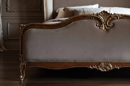 French Louis XV upholstered footboard with intricate hand carving and curved Rococo design, luxury solid wood bed frame detail