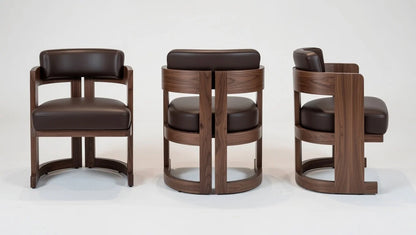 Luxury walnut swivel dining chair with curved open-frame back, padded dark brown leather seat, and sculpted solid walnut frame – front, side, and angled views