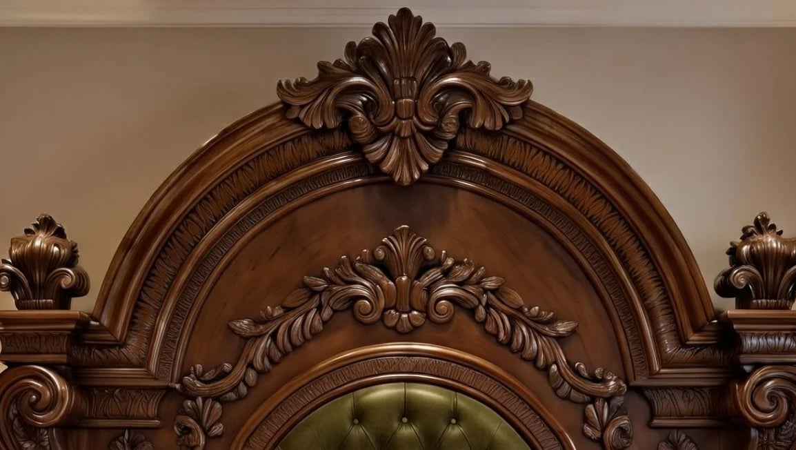 Close-up of intricate hand-carved floral details on the massive wooden headboard of the Maharaja round bed