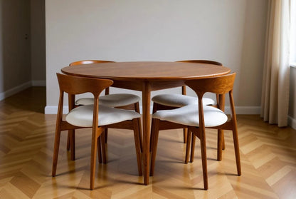Mid-century modern oval walnut dining set with 4 curved "Cow Horn" chairs in cozy contemporary interior, handcrafted Danish-style minimalist design