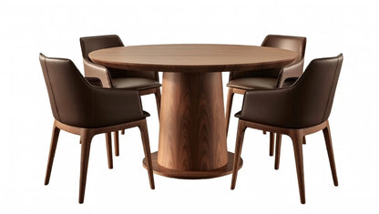 Modern round walnut dining table with wide pedestal base, surrounded by four brown leather curved armchairs.