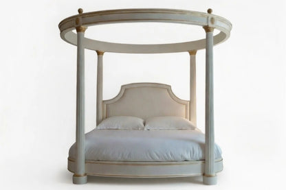 Bespoke hand-carved solid teak round four-poster bed with antique gold finish and white circular canopy by Makin' It Home.