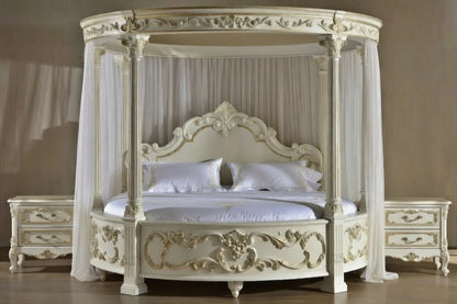 Bespoke hand-carved solid teak round four poster bed with antique white and gold finish and sheer circular canopy drapes