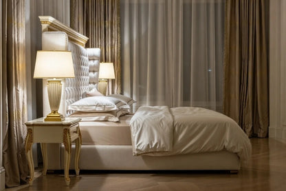 Luxury royal wingback shelter panel bed in ivory upholstery, deep button tufting, plush hotel-style bed with hand-carved wood detailing, premium bedroom furniture