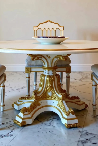 Hand-carved royal white & gold round dining table with polished marble top, intricate gold leaf rim and ornate Empire pedestal base, neoclassical luxury furniture