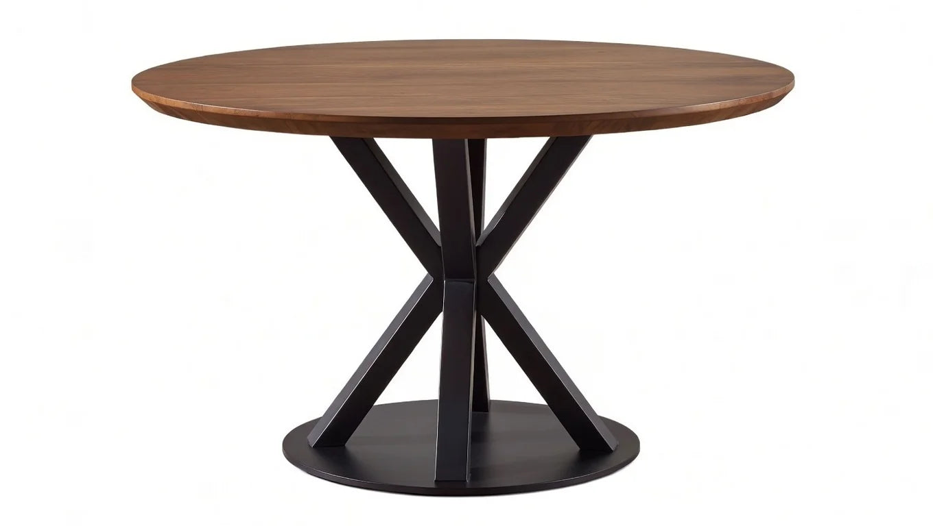 Elegant round solid walnut dining table featuring smooth edge and bold black geometric X-cross pedestal base, minimalist Scandinavian design